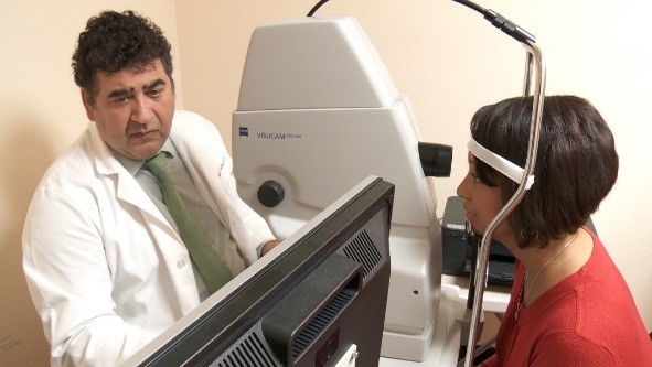 opthalmologist performing eye exam