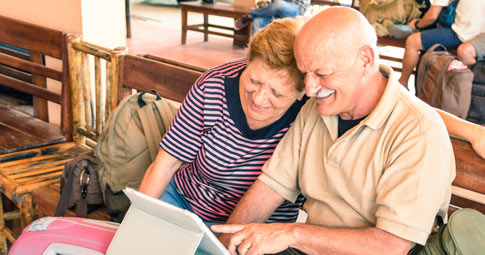 Two adults using an iPad